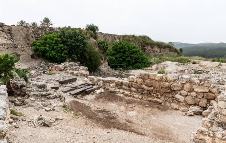Photo for Remains of the Canaanite Palace walls at the excavation of the Canaanite Fortifications of the Megiddo site near Yokneam city in the northern Israel - Royalty Free Image