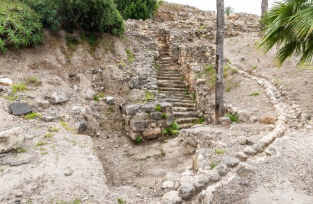 Photo for Well preserved stone steps at excavation of the Canaanite Fortifications of the Megiddo site near Yokneam city in the northern Israel - Royalty Free Image