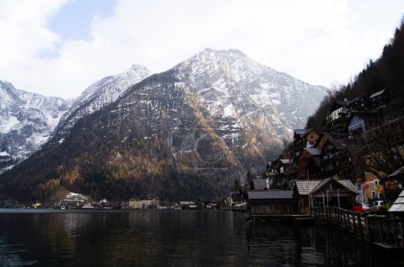 Photo for Hallstatt town in Austria surrounded by Alps. Vilage in mountains. Wallpaper - Royalty Free Image