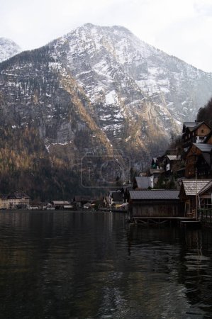 Photo for Hallstatt town in Austria surrounded by Alps. Vilage in mountains. - Royalty Free Image