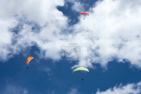 Photo for Paragliders flying together over the municipality of Cocorna, Antioquia. Colombia - Royalty Free Image