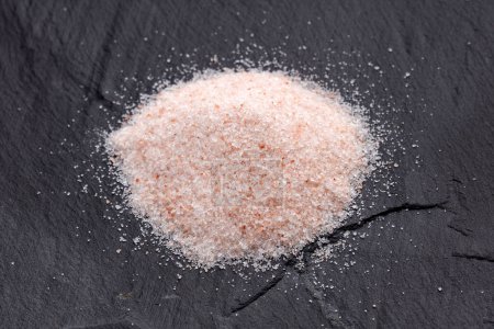 Photo for Pink Himalayan sea salt fine grain and crystals - Royalty Free Image