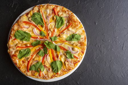 Photo for Vegetable pizza - Neapolitan sauce and cheese base - Royalty Free Image