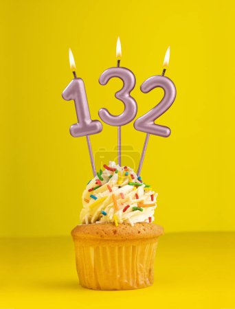 Photo for Number 132 candle - Birthday card design in yellow background - Royalty Free Image
