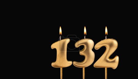 Photo for Birthday candle number 132 - Birthday celebration on black background - Royalty Free Image