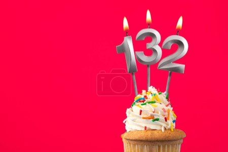 Photo for Burning candle number 132 - Birthday card with cupcake - Royalty Free Image