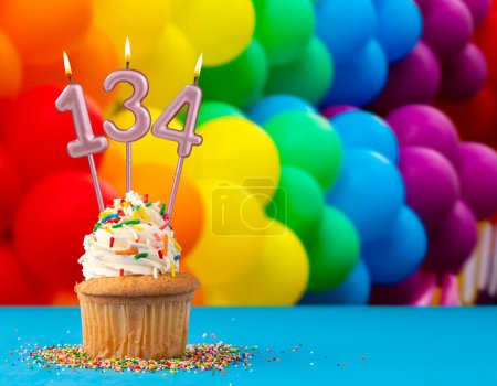 Birthday candle number 134 - Invitation card with balloons in colors of the gay pride march