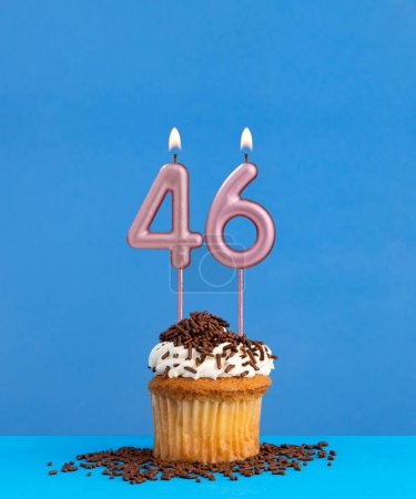Candle number 46 - Birthday card with cupcake on blue background
