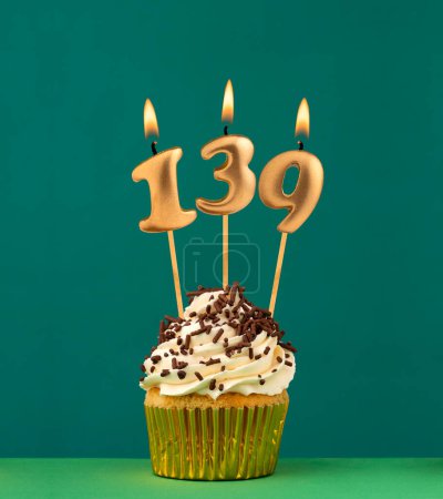 Birthday candle number 139 - Vertical anniversary card with green background