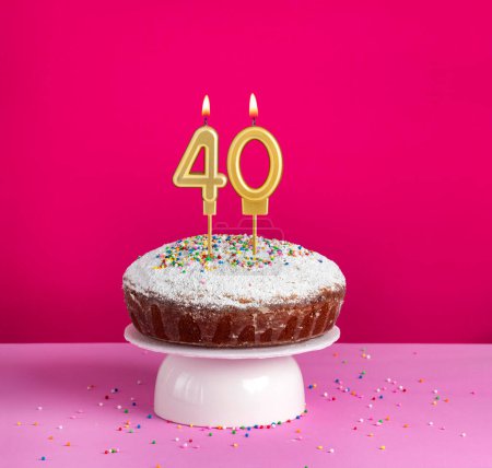Beleuchtete Geburtstagskerze Nummer 40 - Geburtstagskarte auf rosa Hintergrund
