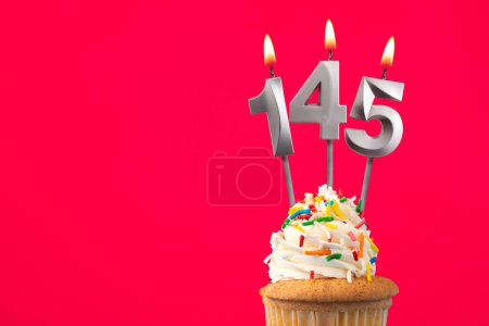 Horizontal birthday card with cupcake - Burning candle number 145