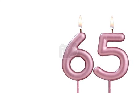 Candle number 65 - Lit birthday candle on white background