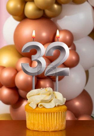 Birthday candle number 32 - Celebration balloons background