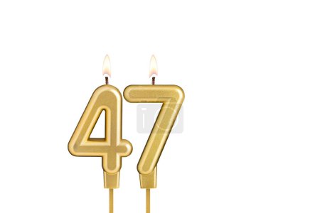 Birthday candle number 47 on white background