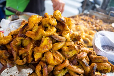 Roasted chinchulin at street stall - Small intestine of the cow