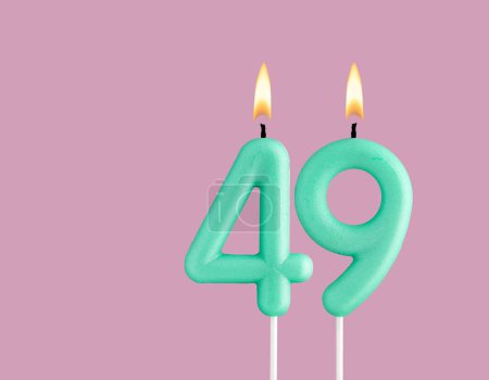 Birthday card with green number 49 candle - Pastel pink background