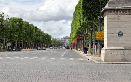 Photo for Paris, France - June 10, 2019: view on the Avenue des Champs-lyses from the Place de la Concorde with Arc de Triomphe in the background - Royalty Free Image