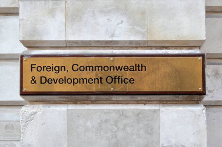 Photo for London, UK - Mar 07, 2021: Sign of Foreign, Commonwealth and Development Office in London, UK - Royalty Free Image