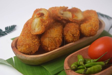 Close up photo of Indonesian food which is often called "Risoles" is a snack with a layer of eggs and flour which has vegetables in it, Isolated white