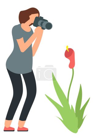 woman tourist taking pictures of flower