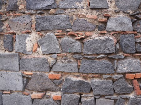 Téléchargez les photos : Texture pierre de lave. Texture brique. mur en roche volcanique de différentes tailles, formes - en image libre de droit