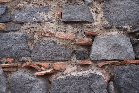 Téléchargez les photos : Texture pierre de lave. Texture brique. mur en roche volcanique de différentes tailles, formes - en image libre de droit