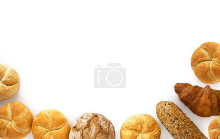 Photo for Assorted bakery products including loafs of bread and rolls - Royalty Free Image