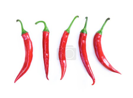 Photo for Hot peppers isolated on white background, top view. Cayenne pepper, Anaheim Pepper, long red peppers isolated. High quality photo - Royalty Free Image