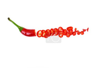 Photo for Red chili pepper sliced partially, isolated on white background. Fresh hot peppers cross section. High quality photo - Royalty Free Image