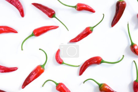 Photo for Hot chilli peppers pattern. Cayenne peppers isolated on white background. Fresno hot peppers pattern - Royalty Free Image
