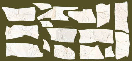 Klebeband-Stücke auf olivem Hintergrund. Papierband zerrissen und zerknitterte Stücke gesetzt. Hochwertiges Foto