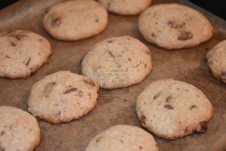 Photo for Chocolate chip cookies on a tray. Homemade cookies with chocolate. High quality photo - Royalty Free Image