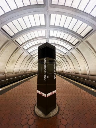 Photo for The Cleveland Park Metro Station platform tunnel, with no people visible, in Washington, DC. The station is part of the Washington metro area transit authority system (WMATA) - Royalty Free Image
