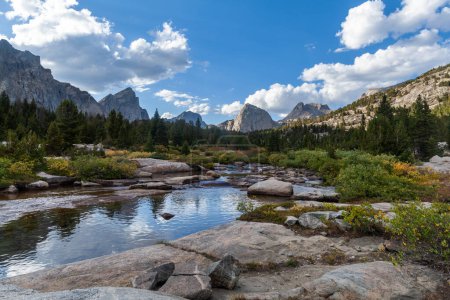 Photo for The East Fork River in the Wind River Range of Wyoming. Left to right, Ambush Peak, Raid Peak and Midsummer Dome are seen to the north. - Royalty Free Image