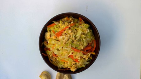 Indonesian cuisine based cabbage with carrots in a bowl called orak arik
