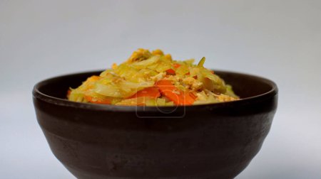 Indonesian cuisine based cabbage with carrots in a bowl called orak arik