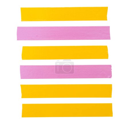 Top view set of yellow and pink adhesive vinyl or cloth tape stripes is isolated on white background with clipping path.