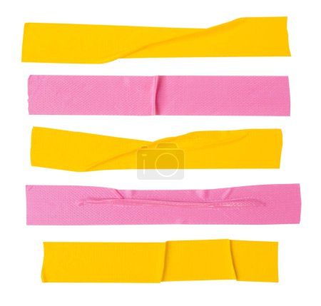 Top view set of pink and yellow wrinkled adhesive vinyl tape or cloth tape in stripes shape is isolated on white background with clipping path.