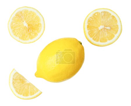 Top view set of beautiful yellow lemon fruit with halves and slices or quarters is isolated on white background with clipping path.