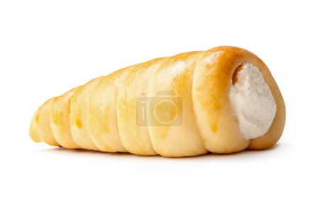 Side view of puff pastry cream horn is isolated on white background with clipping path.