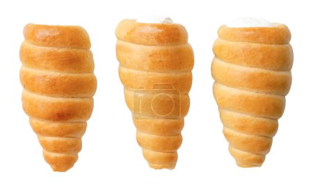 Top view set of puff pastry cream horns scattering is isolated on white background with clipping path.