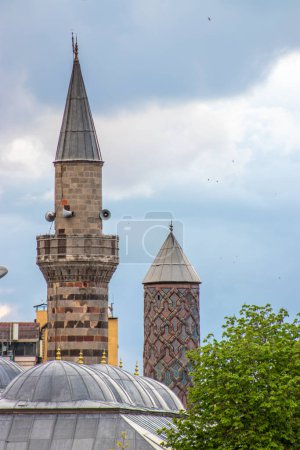 Erzurum Lala Pasa Camii or Lala Pasha Mosque and Yakutiye Madrasa under cloudy skies.