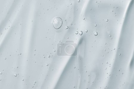 Photo for Texture of face serum. Abstract background of moisturising transparent gel. - Royalty Free Image