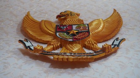 Photo for Surabaya, East Java, Indonesia - February, 2023 : Garuda bird is the national symbol of Indonesia. Similar with eagle or phoenix - Royalty Free Image