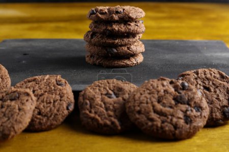 Photo for Chocolate chip cookies on wooden background - Royalty Free Image