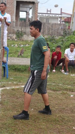 Photo for Gorontalo, March 2023 - A takraw competition held by the youth organization of Tualango village to commemorate the youth competition - Royalty Free Image