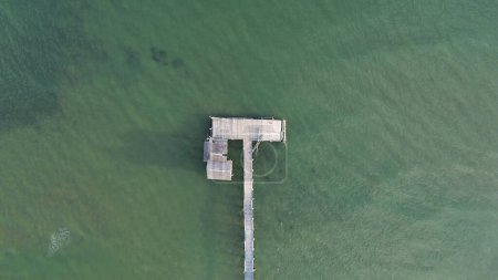 Aerial view of wooden pier in the sea