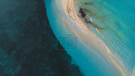 Aerial View of the Sandy Beach with Turquoise Water