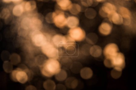 Photo for Blurred image for beautiful backgrounds with bokeh in warm, golden and welcoming light. Copy space. horizontal image - Royalty Free Image
