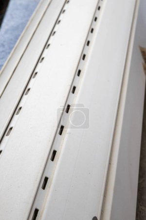 Photo for Detail of old and disused white roller blinds. Close-up abstract image. - Royalty Free Image